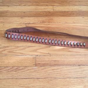 Vintage bullet belt with gold colored buckle